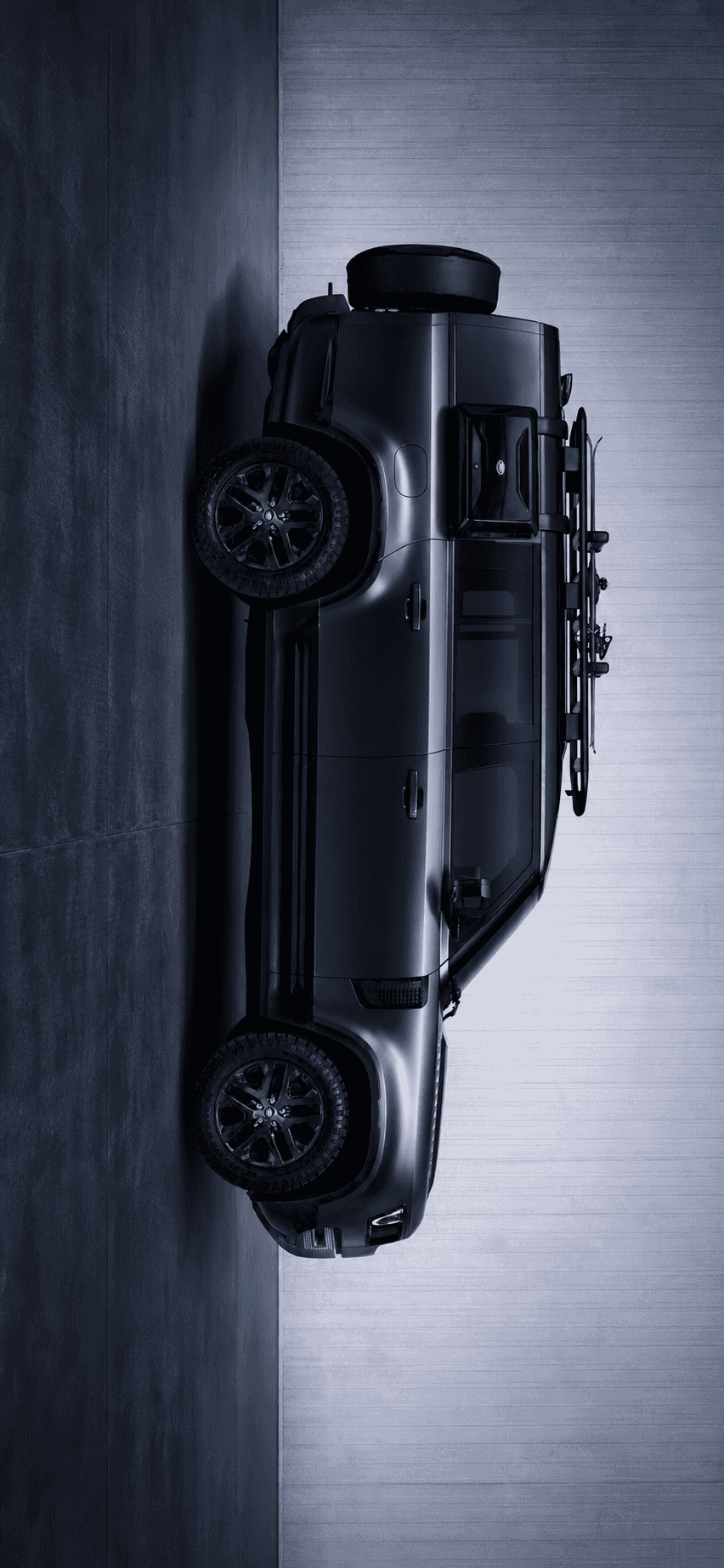 Sleek Dark Defender Overhead — phone wallpaper preview