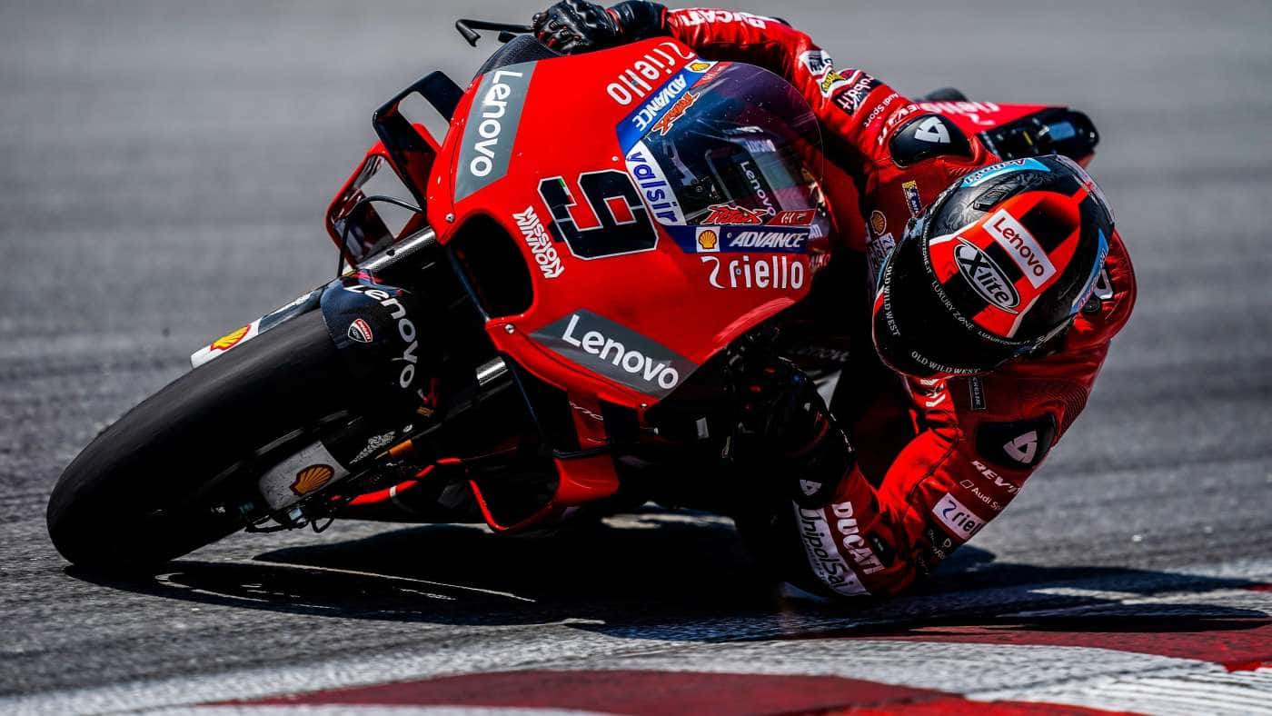 Red Ducati MotoGP Racer Cornering — desktop wallpaper preview
